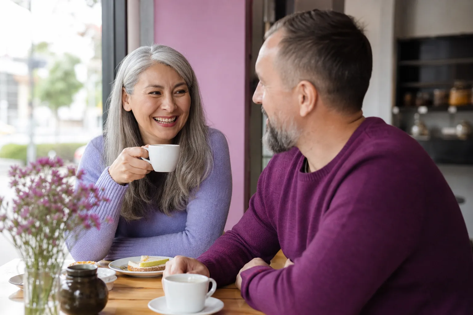 Mature couple talking over coffee in Maidstone town centre
